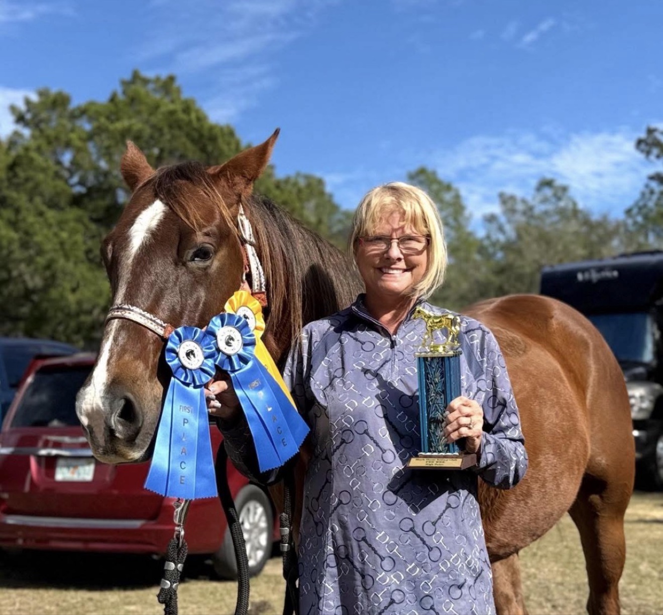 A Hayley Stables customer standing with her purchased horse